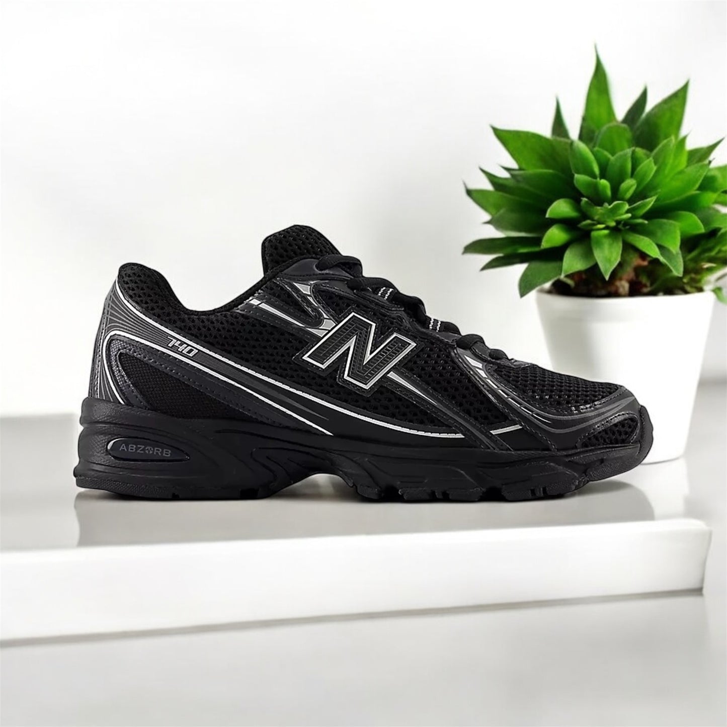 New balance 740 black